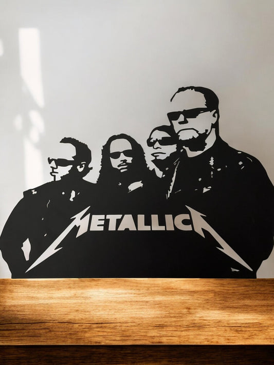 Metallica wall decal on a white wall with a wooden surface below
